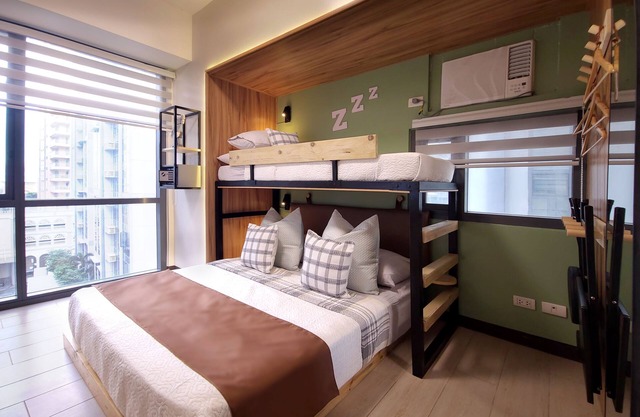 Relax to a family size condo with fun games, popcorn and cinematic movie.