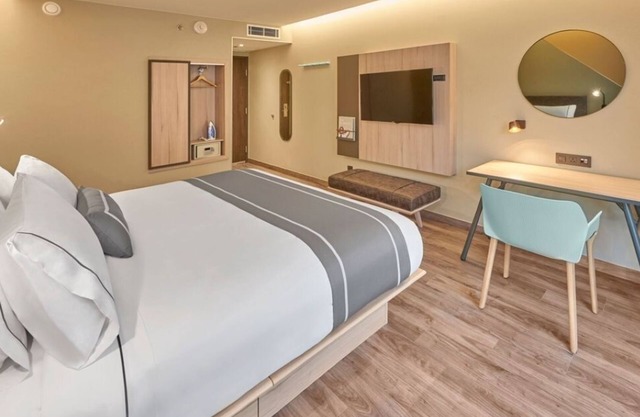 Relaxing Stay Near CUN | 2 Rooms w/Kitchenette, Pool, Rooftop Terrace & Shuttle