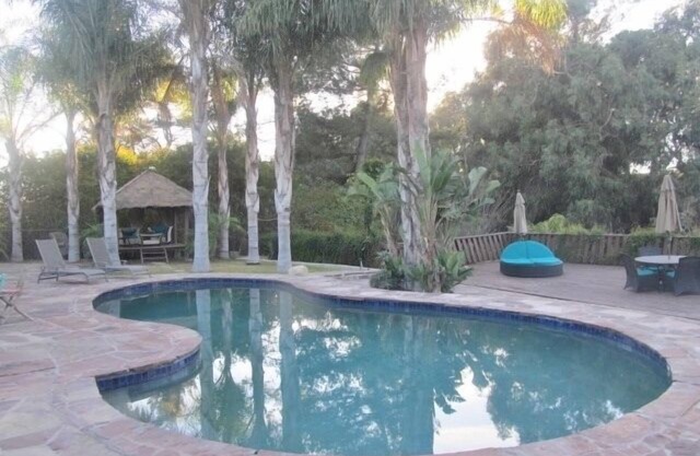 Resort Style Living! A Tropical Paradise Pool Home, Golf Courses