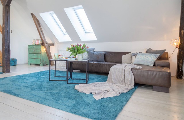 Restored farmhouse on the dyke World Heritage Site Wadden Sea of Schleswig-Holstein