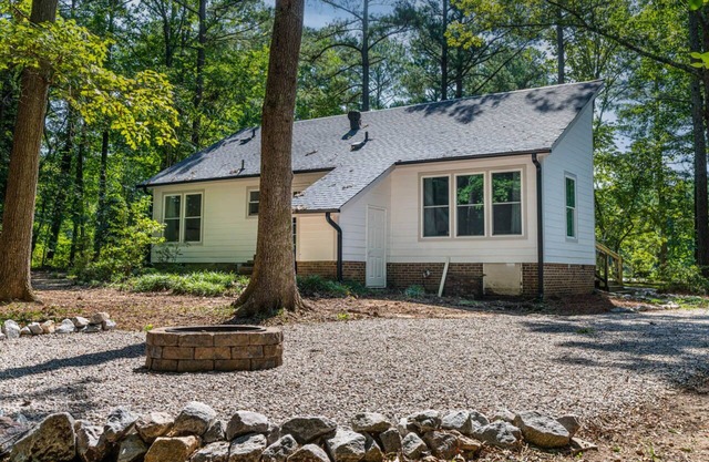 Retreat to your own Refuge w/towering pines & oaks w/firepit close to everything