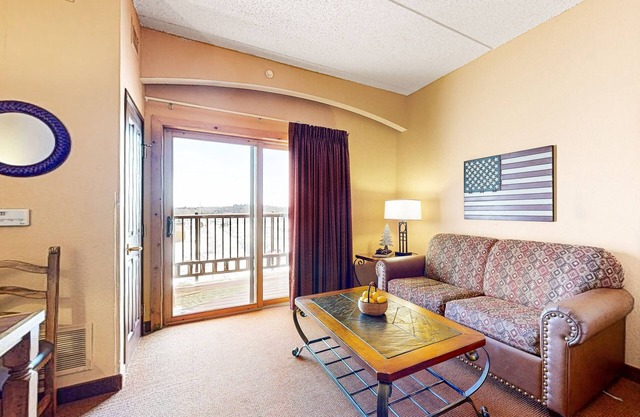 Riverside resort studio with balcony