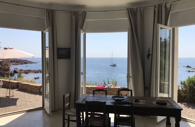 Romantic Provencal house 1947, waterfront on small beach.