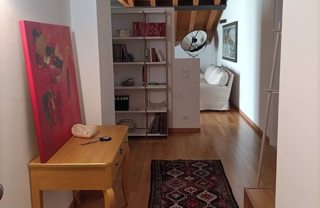 Room in attic penthouse with terrace