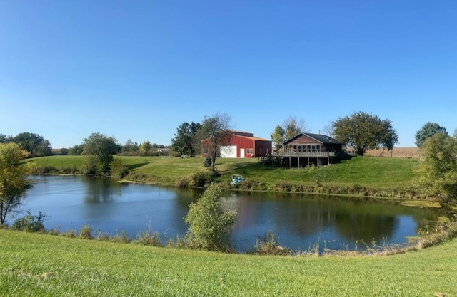 Rustic and Secluded 1 Bedroom Cabin Retreat. Located on Private Stocked Pond.