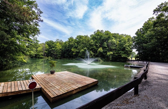 Rustic charm meets modern comfort in this hidden woodland cabin getaway