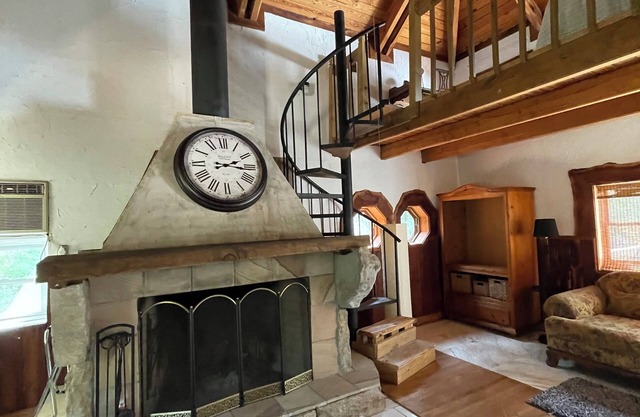 Rustic & unique mountain top cabin with outdoor pavilion, perfect for a getaway.