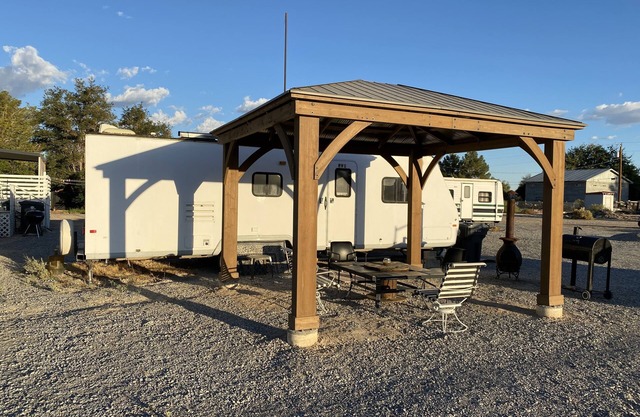 RV1 Camper privacy of your own with 50 amp EV charging outlet available.