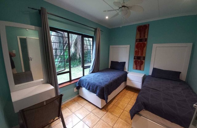 Self catering accommodation with a garden view. 100mt from the beach