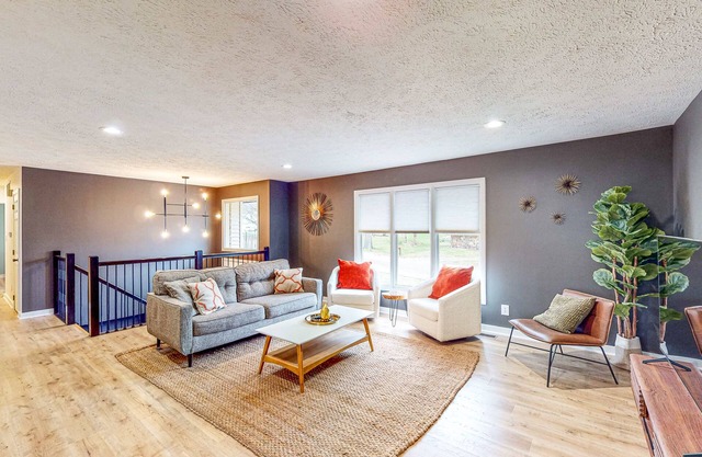 Serene and modern retreat with game room, balcony