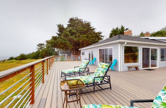 Serene oceanfront home with large deck, panoramic views, dog-friendly, & W/D