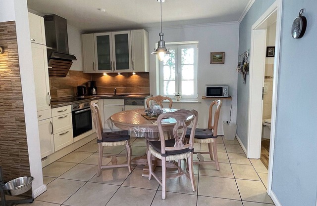 Single-storey half of the house, dog wellness room, fireplace, fenced, modern, WLAN