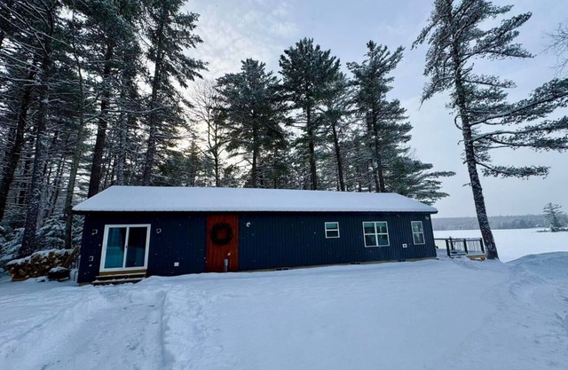 Snowmobiler & Ice Fishing Paradise right on the water with mountain views!