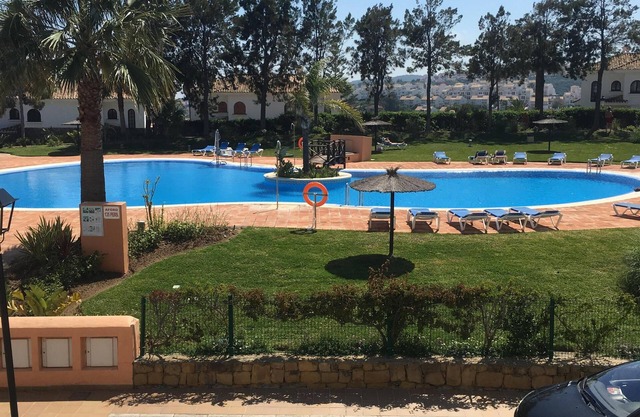 South facing 1st floor apartment over looking the pools, free wi-fi and sky tv