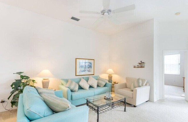 South Facing Pool beside palms and grassland. Light, Spacious with Games Room ,