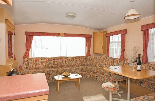 Spacious 12ft wide caravan with one double and one twin.