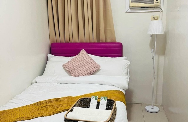Spacious 2-bedroom condo in Quezon City with AC, WiFi
