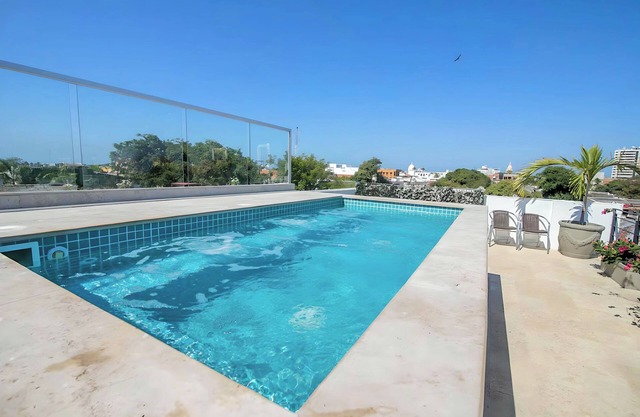 Spacious 9-bedroom house with WiFi, AC in vibrant Cartagena Bolivar +Bonus