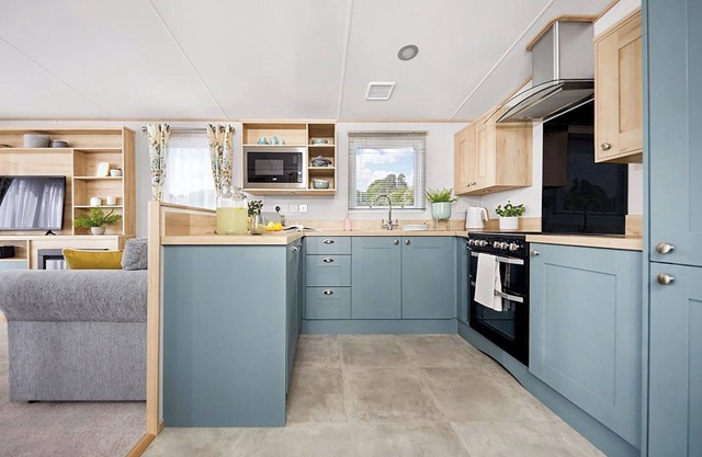 Spacious and modern 12ft-wide caravan with one double and two twin.