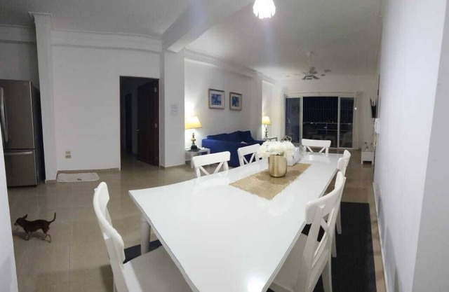 Spacious and relaxing with an amazing town skyline and far island & ocean view.