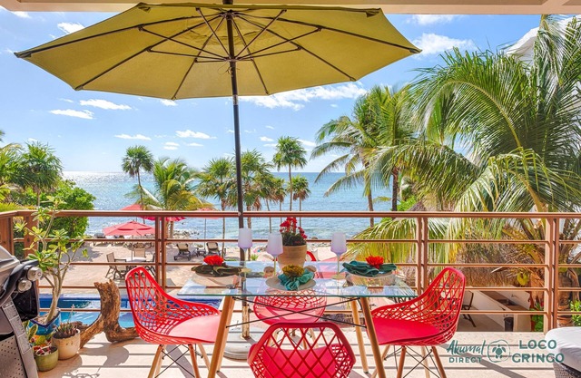 Spacious beachfront condo with AC, WiFi, swimming pool!