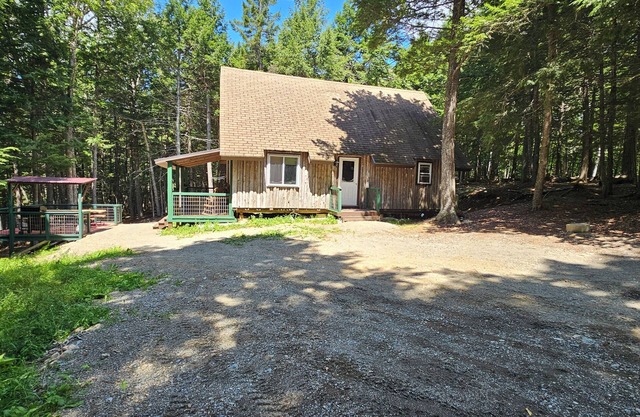 Spacious cabin on beautiful Long Lake w/waterfront view, private dock, fire pit.