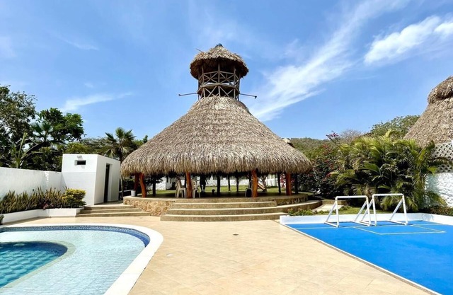 Spacious cabin with pool and kiosk in Palmarito