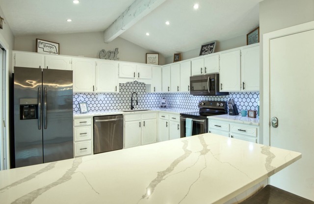 Spacious Friends & Family Retreat in SW Omaha – Hot Tub, Patio & More!