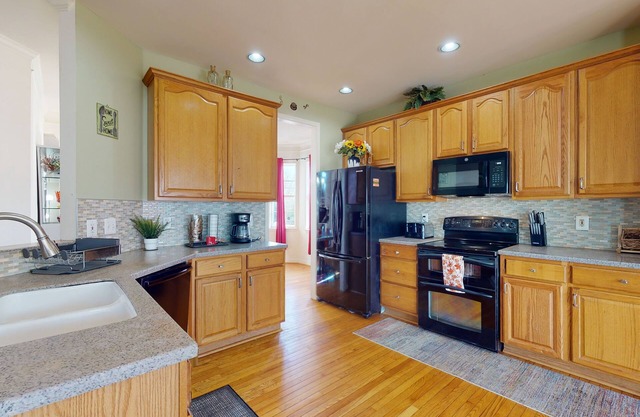 Spacious home w/enclosed yard & playground