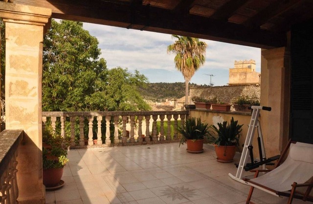 Spacious house with many terraces, garden and swimming pool in quiet village