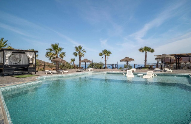 Spacious, rustic cottage with sea view.