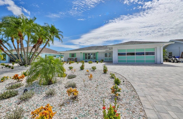 Spacious waterfront home in Apollo Beach w/private swimming pool and boat dock.