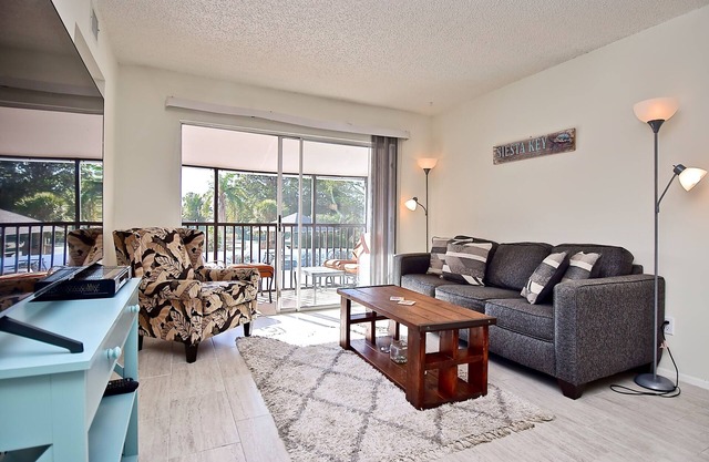 Steps to #1 Siesta Beach, 2nd Floor, Smart TV, Garbage Disposal, Near Pool.