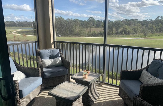 Striking 3rd floor 2/bed, 2/bath condo with golf & lake view