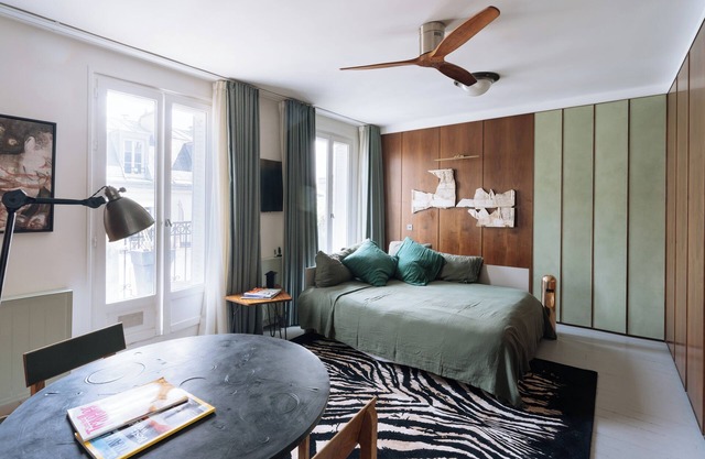 Studio lumineux Paris 11 avec un balcon