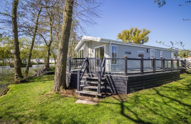 Stunning lodge boasting lake views at Weely Bridge Holiday Park ref 69005L