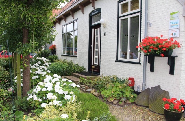 Stylish apartment with garden in a former farmhouse in De Waal