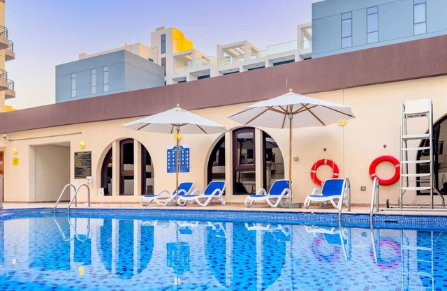 Stylish Dubai 1BR | Balcony Pool Views Near Miracle Garden & Mall