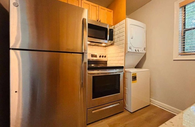 Stylish Stay in the Heart of Decatur King Bed + Modern Touches