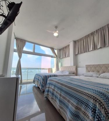 Suítes Pitangueiras - POUSADA FRENTE MAR