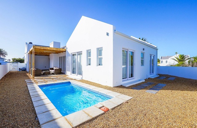 Sunlit Oasis Ocean and Golf Retreat