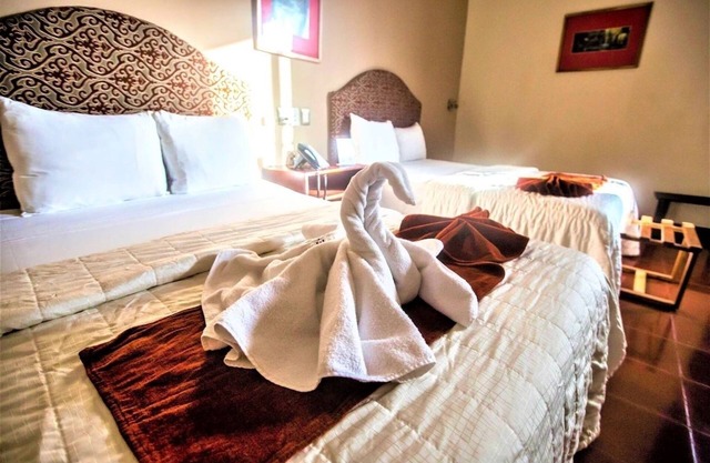 Sunny Mérida Double Room Stay | Modern Suites with Pool and Colorful Charm