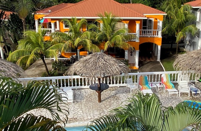 Sunset 8A: Charming 2-Bedroom Condo in popular Sunset Villas, West End with Pool