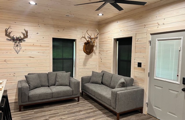 TAKE IT EASY Fishing Cabin. Large enclosed bay for storing the boat.