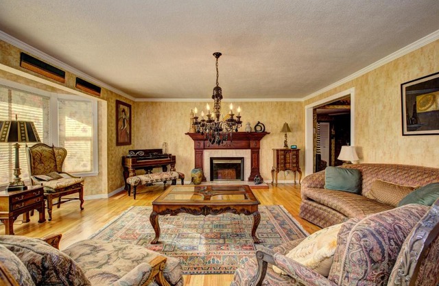 The Doll House an eclectic style of art and old fashioned doll and antique collections in a doll house designed home in Boise's desirable North End across from a nice park with tennis and basement and walking trails near shopping, hiking, biking, skiing