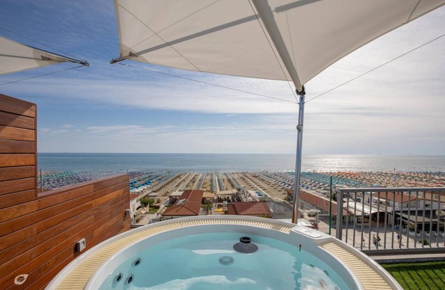 The Lighthouse beachfront penthouse with private parking space
