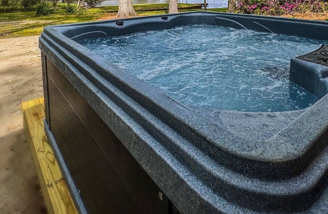 The Nautical Retreat: Furnished Lakeside Escape with Hot Tub & Pedal Boat