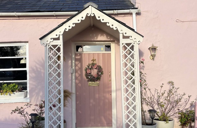The Pink Cottage Upstairs Suite and Secret Garden. beautiful walks & sea view.