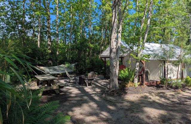 The Rustic Glamping Tent Where Coastal Charm Awaits – 2 Miles from Holden Beach