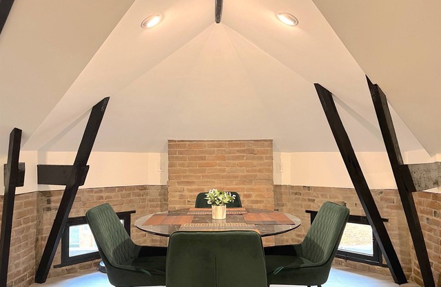 The Top of the Stairs: Chic Loft on 3rd Ave